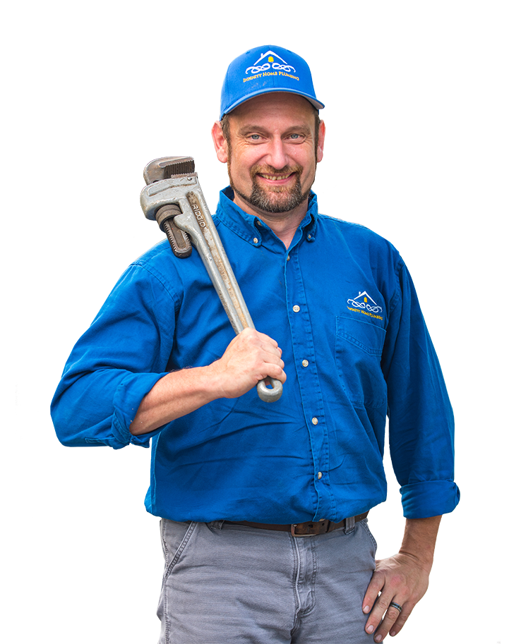 A man holding a wrench in his hand.